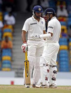 VVS Laxman, and Rahul Dravid, talk between overs during the fourth day of the second Test